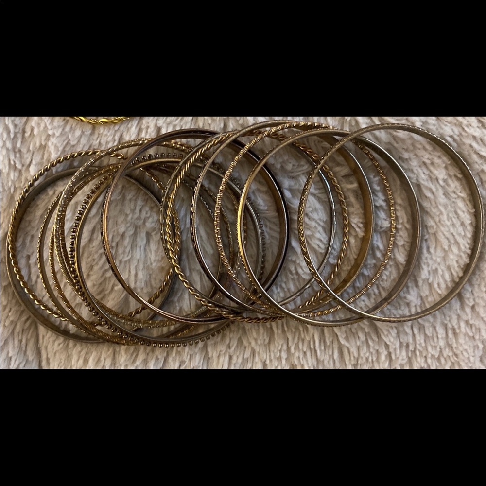 Bundle of gold bracelets/ jewelry
